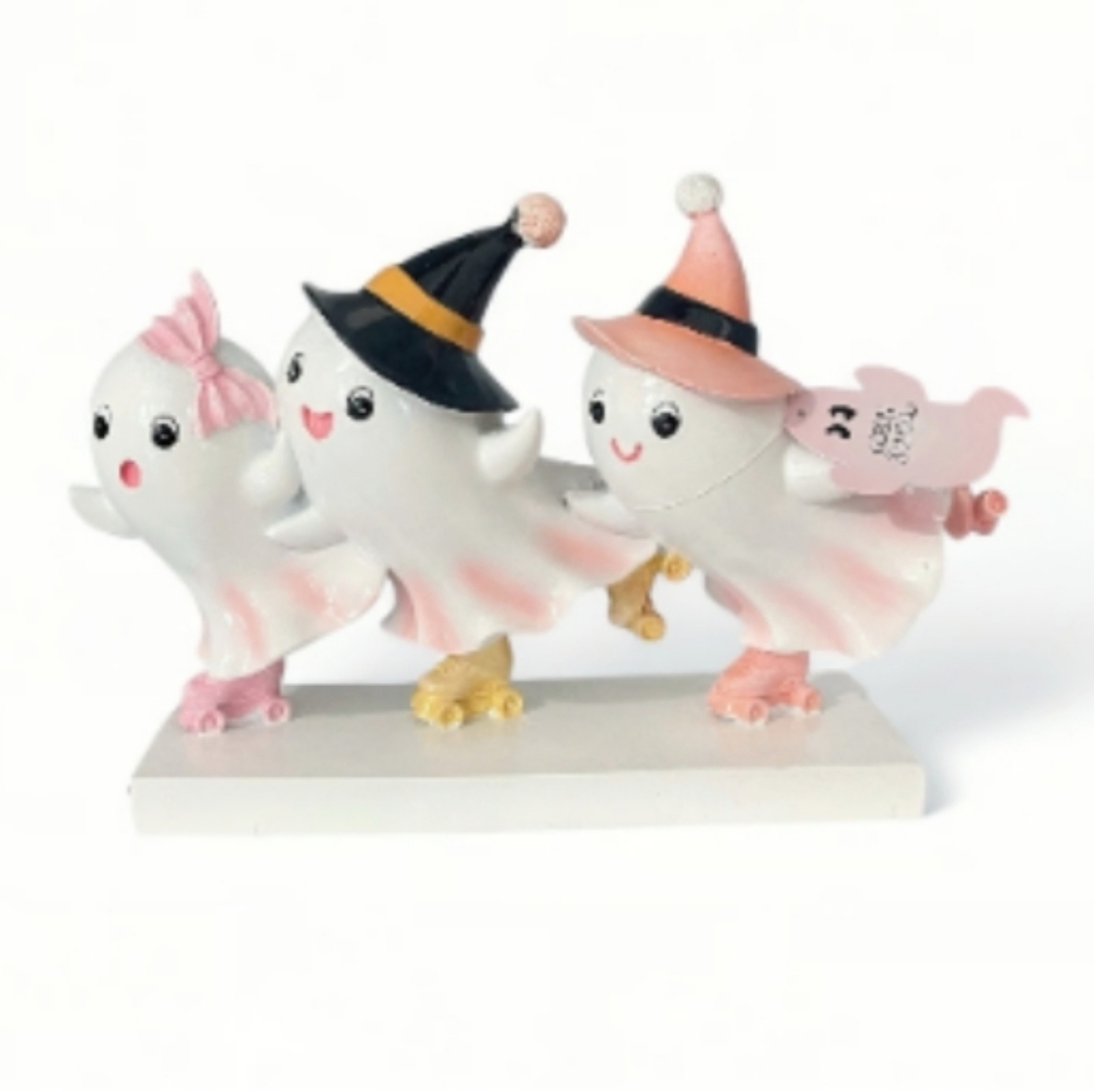 Witchy ghost girls roller skating ,ghost girls skating , skating ghost figurine